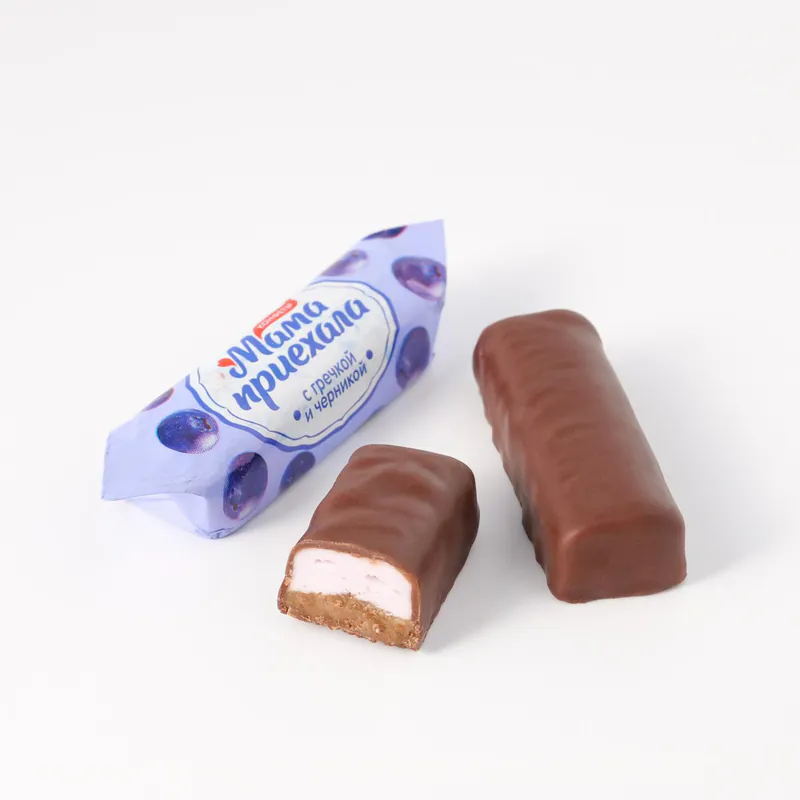 Candies With Chocolate Icing With A Body Based On Exploded Cereals And Whipped Mass Mom Has Arrived